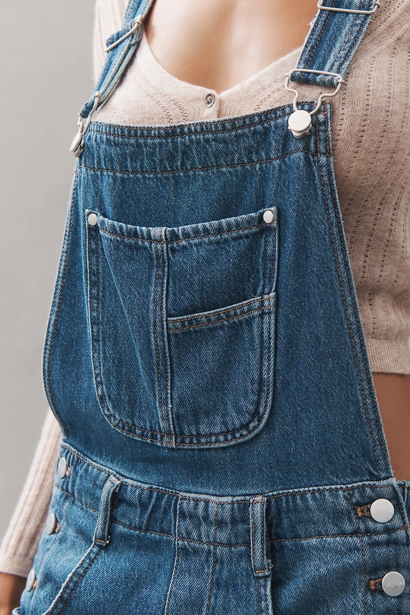The Adi Denim Flare Overalls by Pilcro