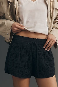 Ollari Eyelet Track Shorts