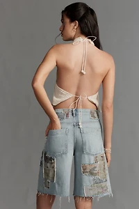 The Adi Patchwork Mid-Rise Relaxed Bermuda Shorts by Pilcro