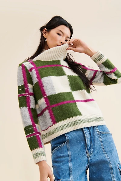 $525 Ria Turtleneck Sweater