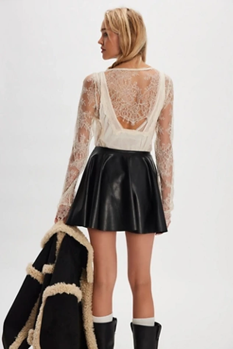 Norma Kamali Flared Vegan Mini Skirt