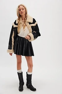 Norma Kamali Flared Vegan Mini Skirt