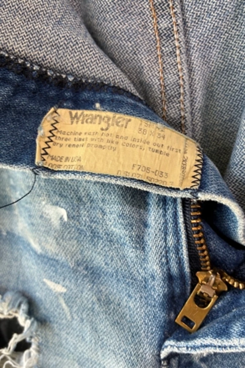 Wrangler Distressed and Paint Splattered Jeans Selected by The Curatorial Dept.