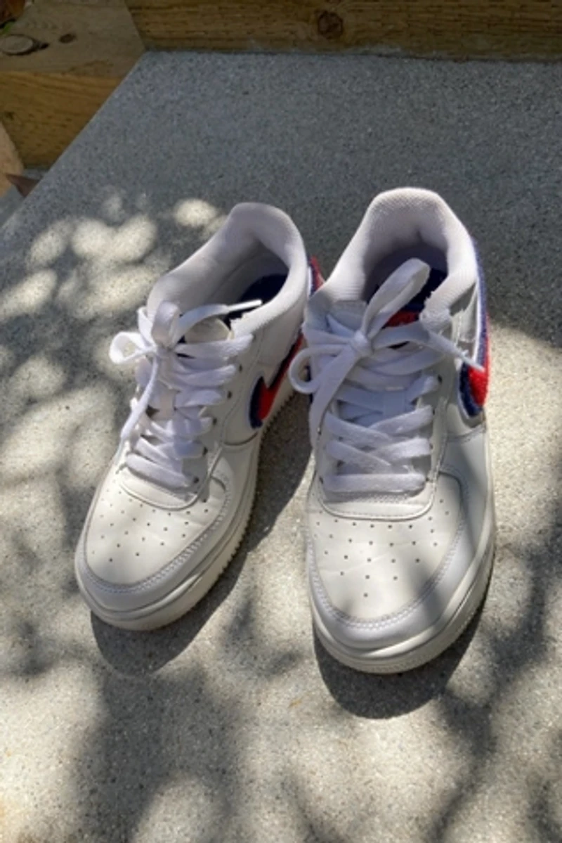 White Nike Air Force 1 with Red and Blue "Chenille Swoosh" Selected by The Curatorial Dept.