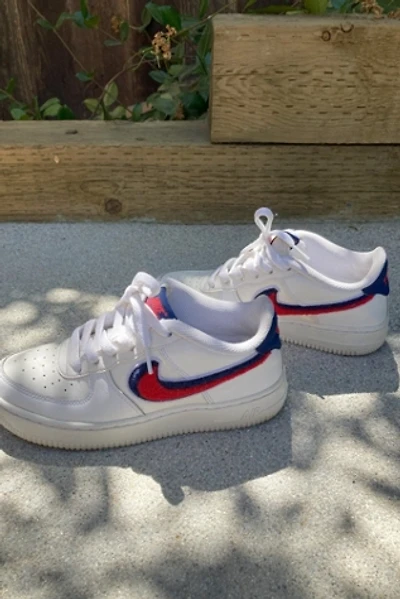 White Nike Air Force 1 with Red and Blue "Chenille Swoosh" Selected by The Curatorial Dept.