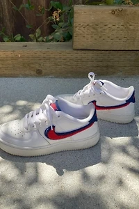 White Nike Air Force 1 with Red and Blue "Chenille Swoosh" Selected by The Curatorial Dept.