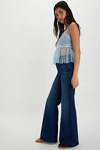 MOTHER The Hustler Roller Sneak Jeans