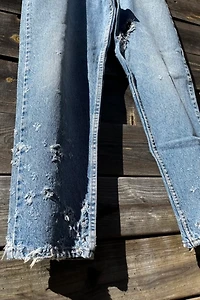 Distressed Light Wash Levi's Jeans Selected by Wax Plant