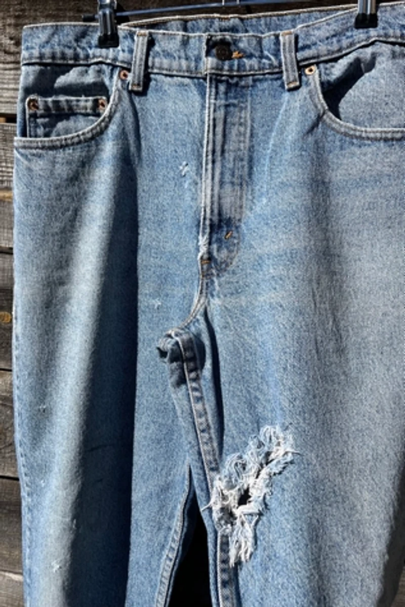 Distressed Light Wash Levi's Jeans Selected by Wax Plant