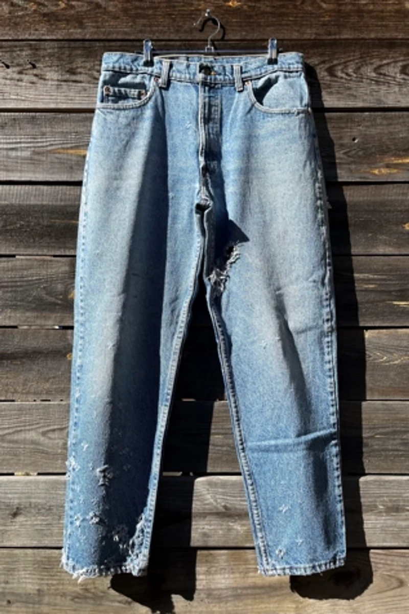 Distressed Light Wash Levi's Jeans Selected by Wax Plant