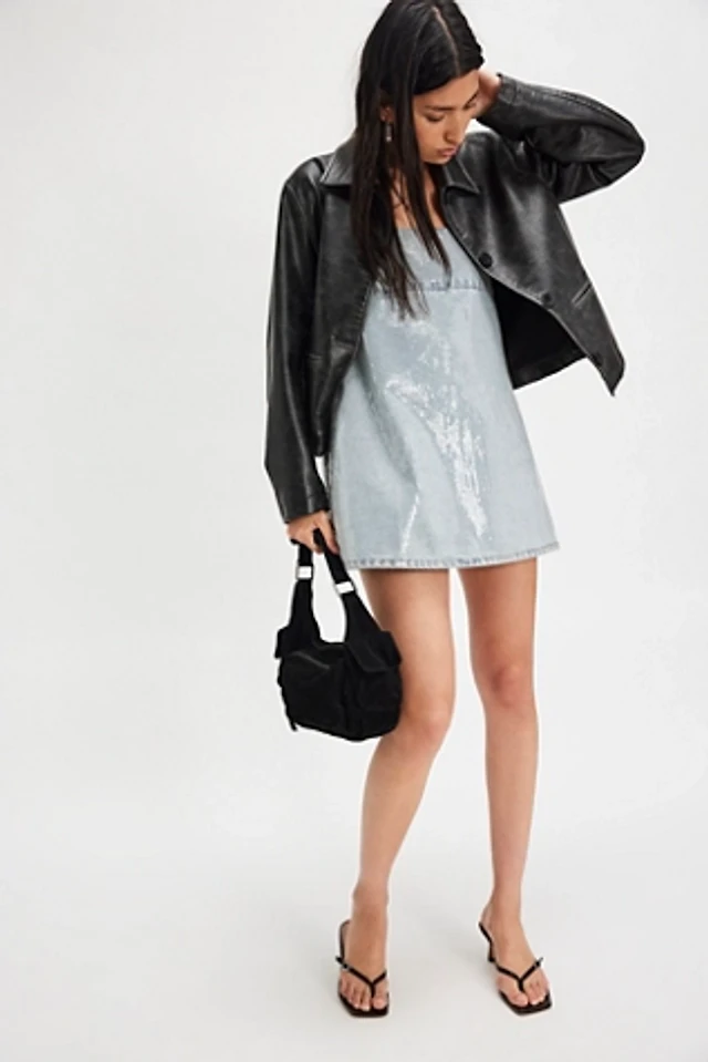 denim dress with leather jacket Women's Outfit: Black Leather Biker Jacket, White Print Cami Dress, Blue Ripped Jeans, Black Leather Lace-up Ankle Boots