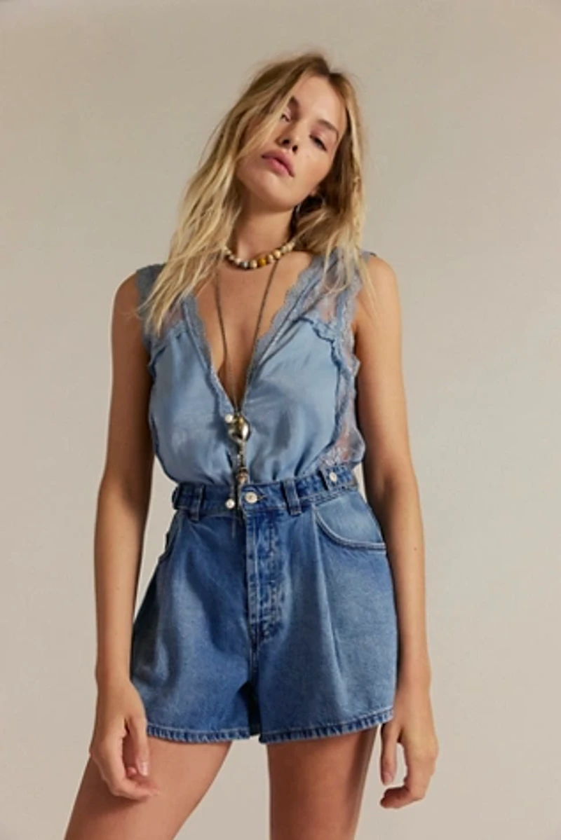 CRVY Moon Sign Pleated Shorts