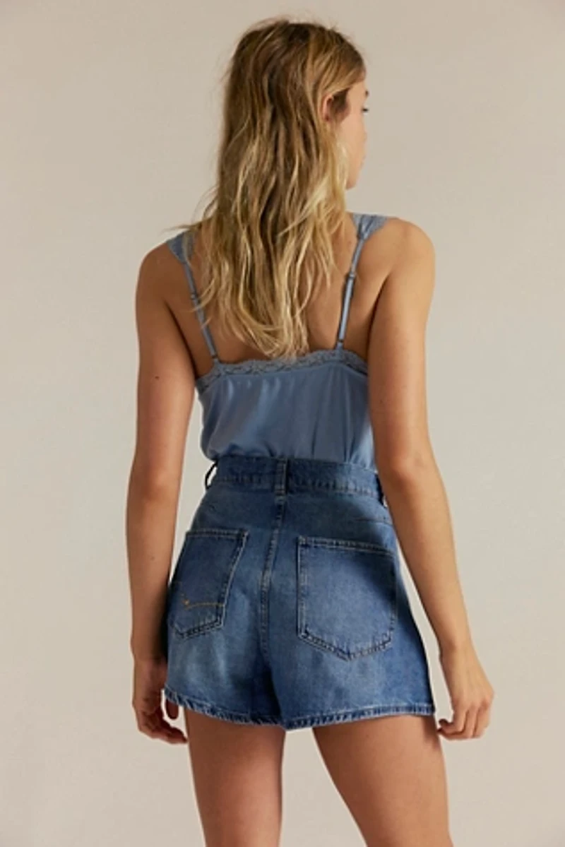 CRVY Moon Sign Pleated Shorts