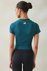 New Balance Tournament Cropped Short Sleeve Polo