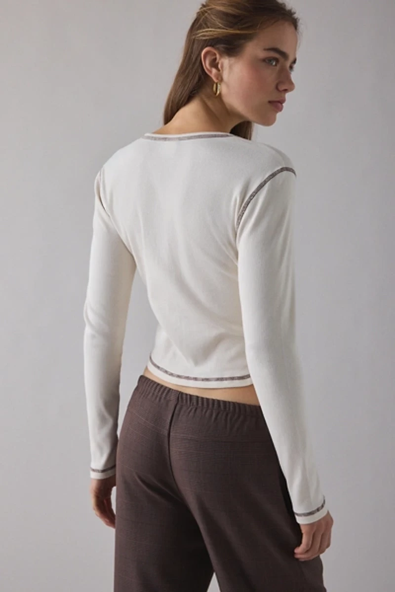 Swan El Amor Graphic Notched V-Neck Long Sleeve Baby Tee