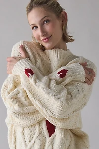 UO Alexa Heart Cable Knit Mockneck Sweater