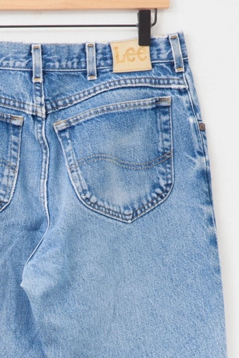 Vintage 1990s Distressed Lee Light Wash Denim Blue Jeans