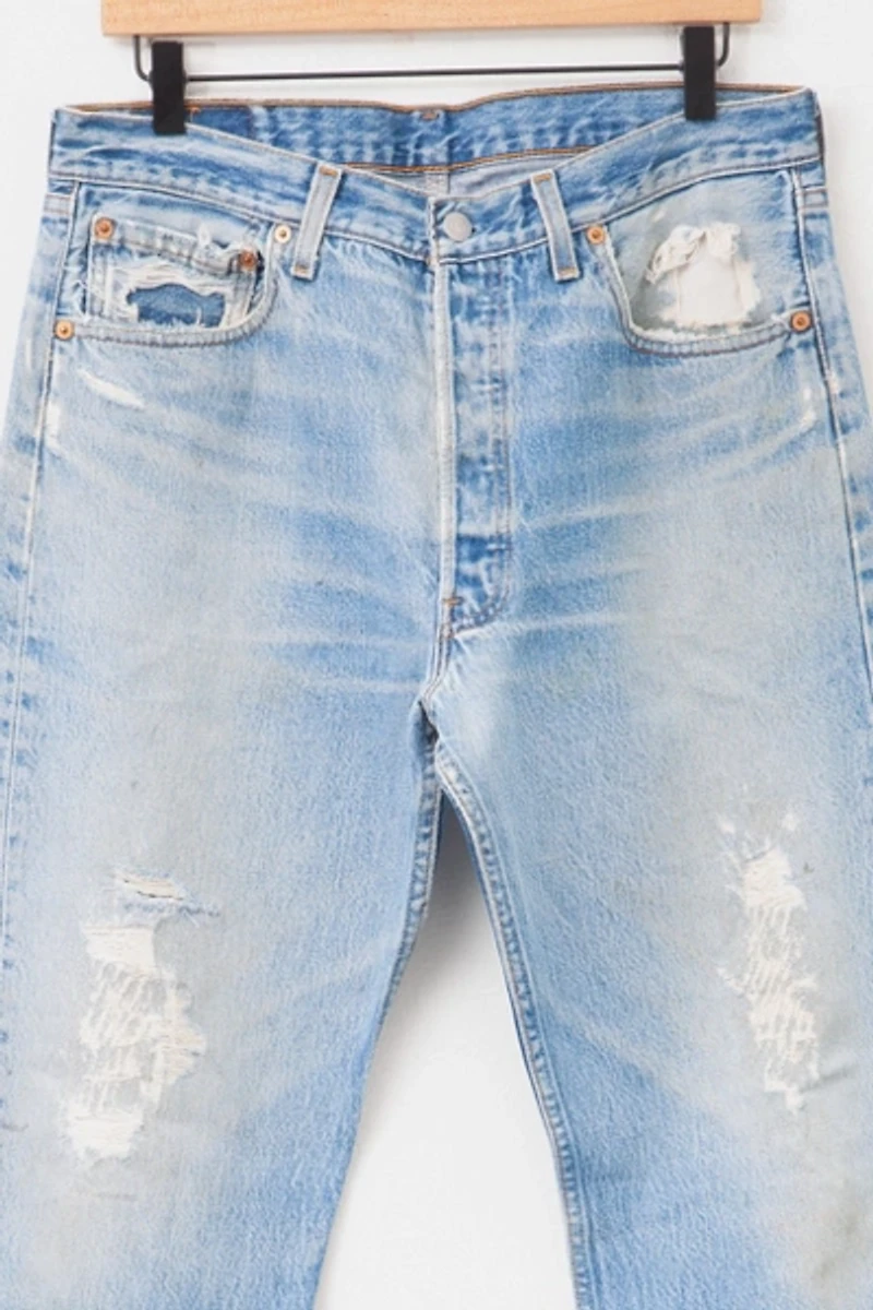 Vintage 1990s Levi’s® 501 Made in USA Light Wash Distressed Denim Jeans
