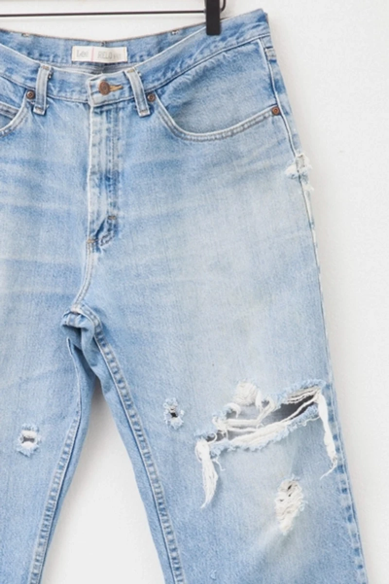 Vintage 1990s Heavily Distressed Lee Relaxed Fit Light Blue Denim Jeans