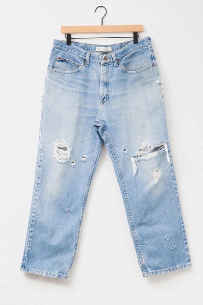 Vintage 1990s Heavily Distressed Lee Relaxed Fit Light Blue Denim Jeans