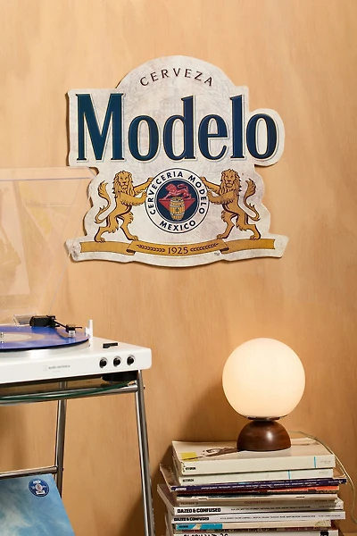 Modelo Logo Shaped Embossed Metal Wall Sign