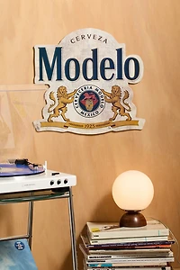 Modelo Logo Shaped Embossed Metal Wall Sign