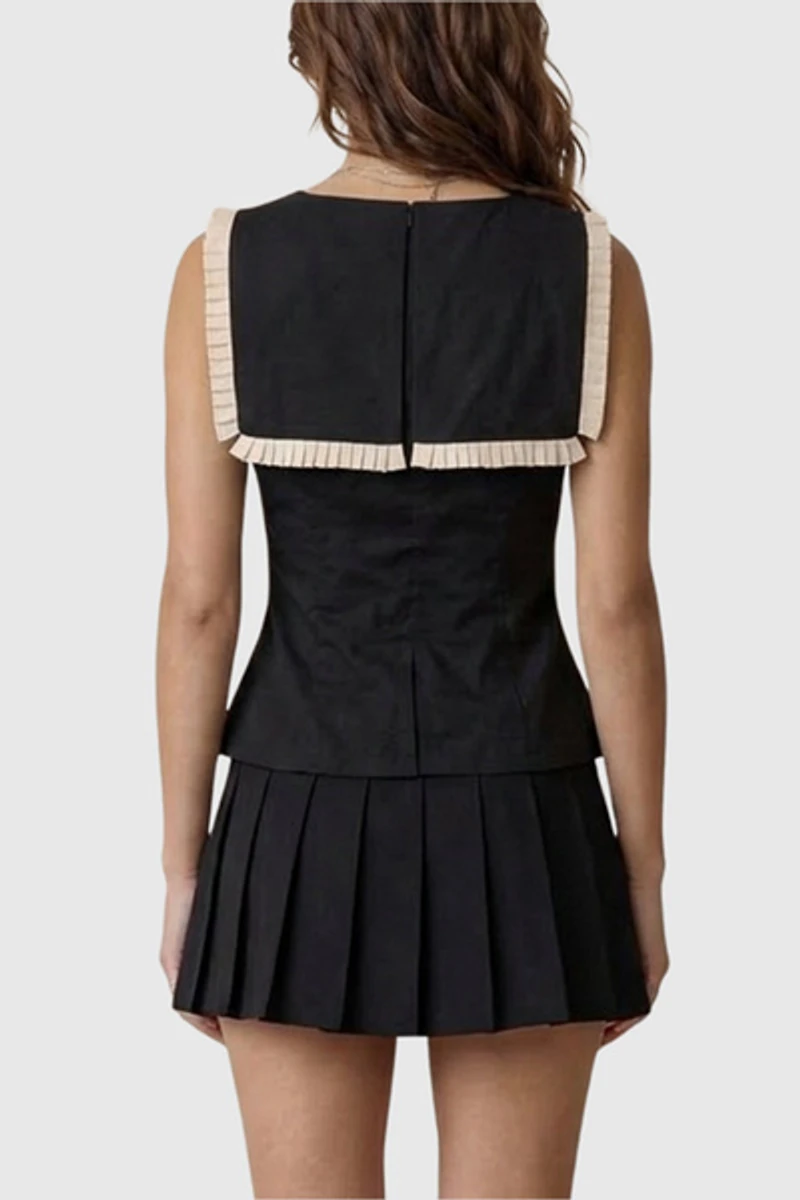 Modenaire Ruffle Trim Peplum Top With Contrast Bib