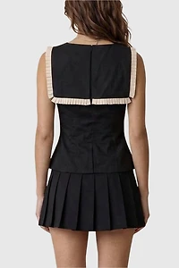 Modenaire Ruffle Trim Peplum Top With Contrast Bib