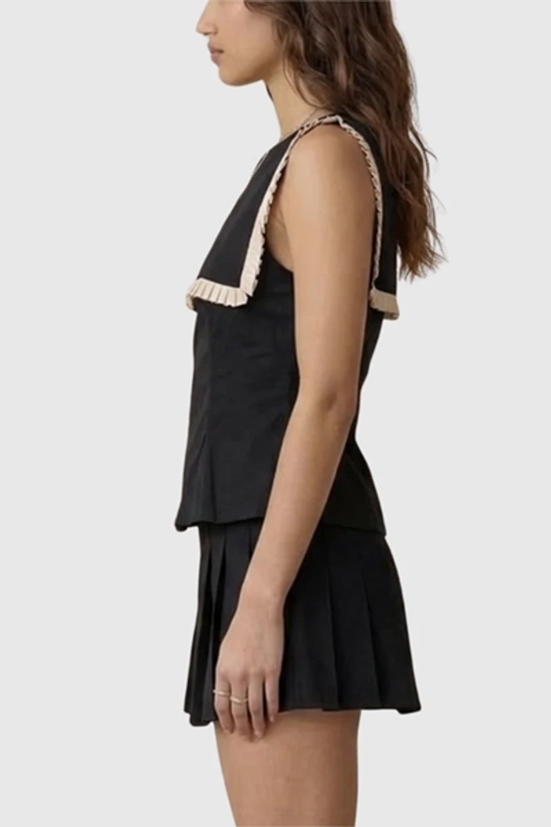 Modenaire Ruffle Trim Peplum Top With Contrast Bib