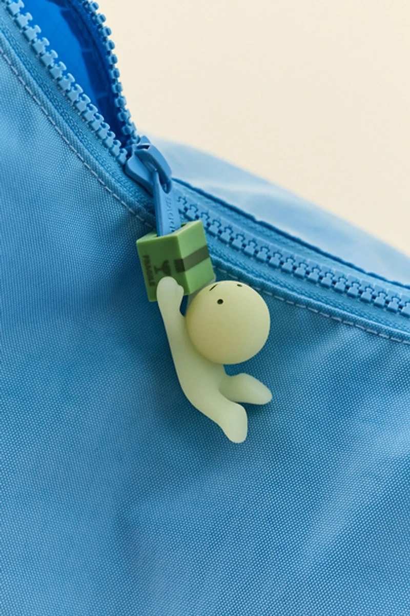 Smiski® Glow-In-The-Dark ZipperBite Figure