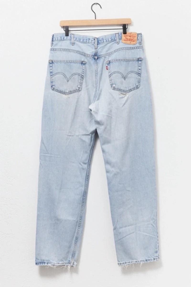 Vintage 1990s Levi’s® 550 Distressed Light Wash Denim Jeans