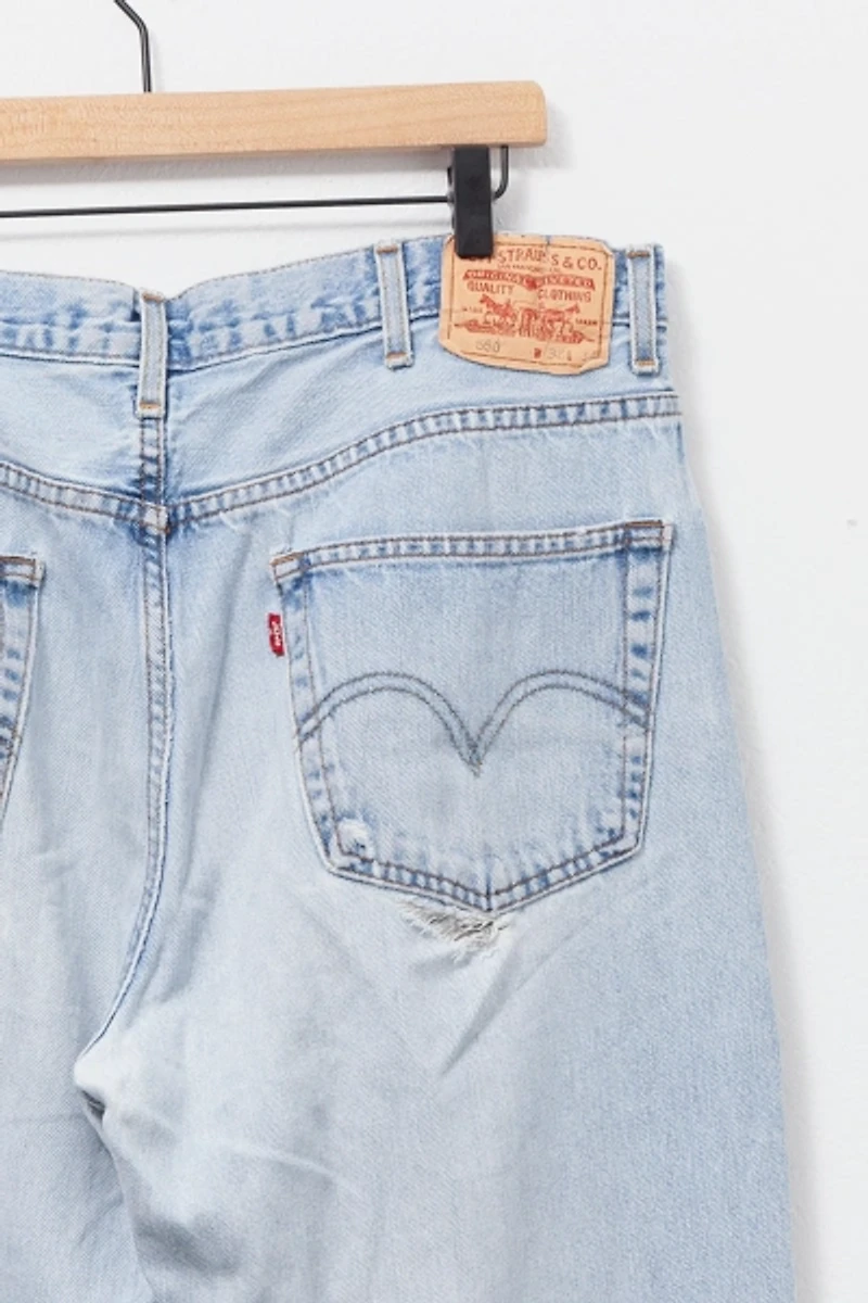 Vintage 1990s Levi’s® 550 Distressed Light Wash Denim Jeans