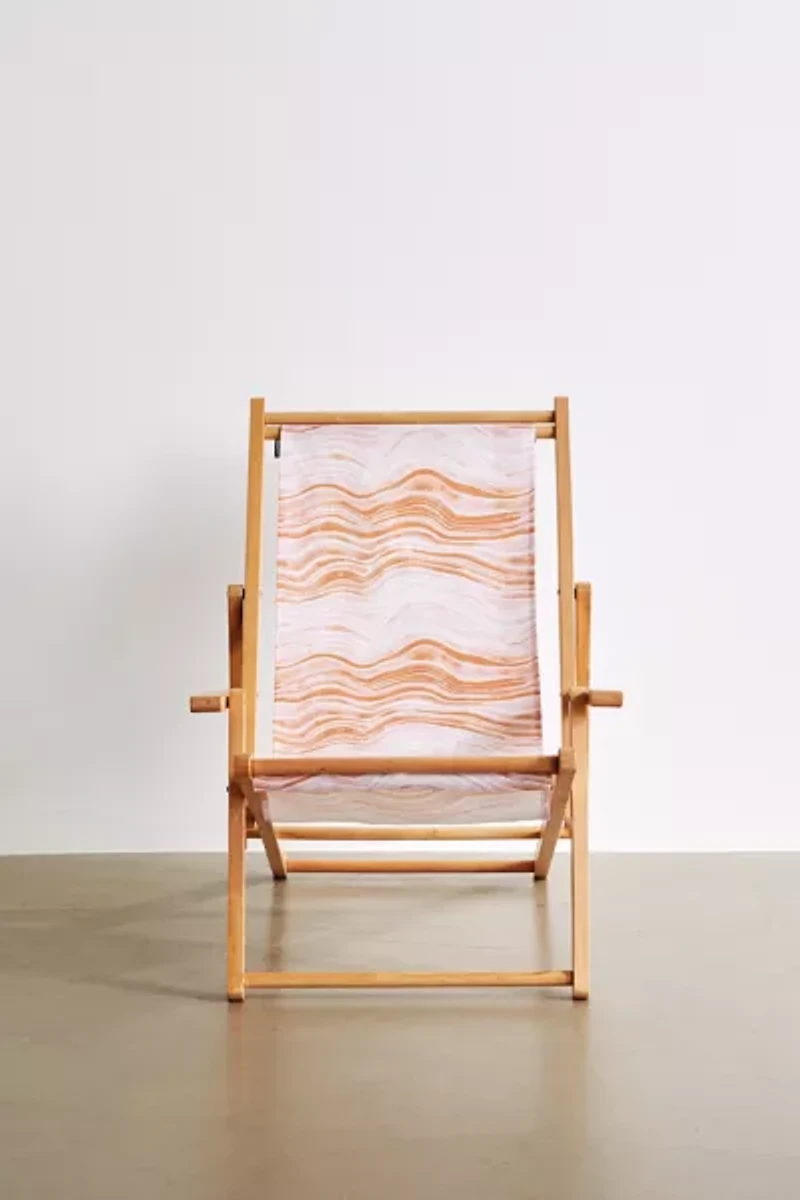 Deny UO Exclusive Red Swirl Outdoor Folding Chair