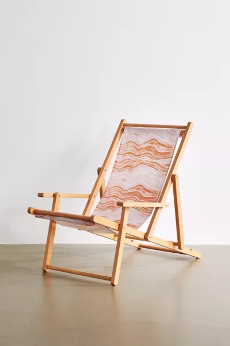 Deny UO Exclusive Red Swirl Outdoor Folding Chair