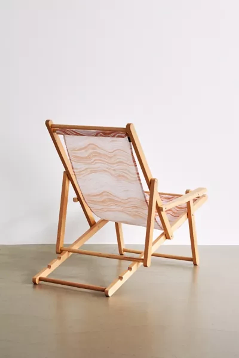 Deny UO Exclusive Red Swirl Outdoor Folding Chair