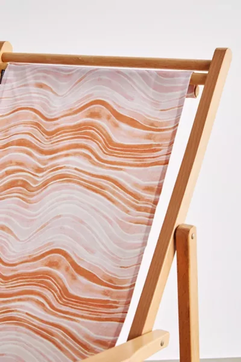 Deny UO Exclusive Red Swirl Outdoor Folding Chair