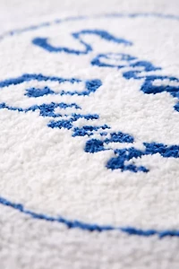 Serving… Round Scalloped Tufted Bath Mat