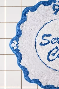 Serving… Round Scalloped Tufted Bath Mat