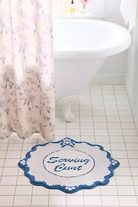 Serving… Round Scalloped Tufted Bath Mat