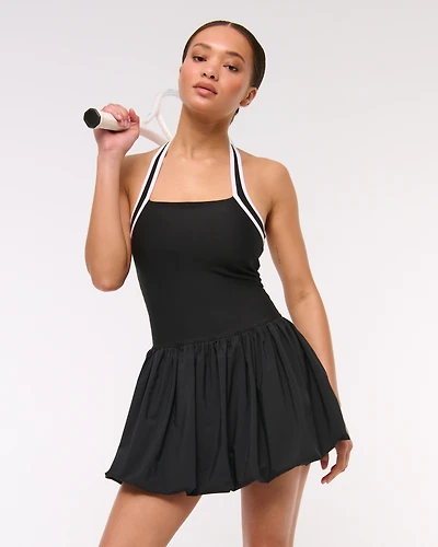 YPB motionTEK Halter Bubble Hem Mini Dress