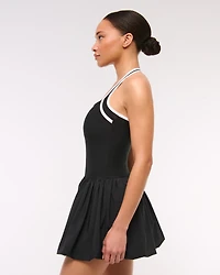 YPB motionTEK Halter Bubble Hem Mini Dress