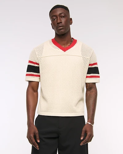 Suéter inspirado en una camiseta de fútbol