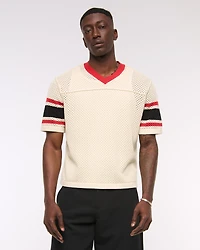 Suéter inspirado en una camiseta de fútbol