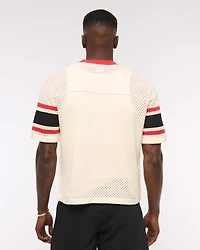 Suéter inspirado en una camiseta de fútbol