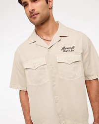 Short-Sleeve Cropped Western Graphic Button-Up Shirt