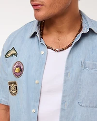 Short-Sleeve Cropped Graphic Denim Button-Up Shirt