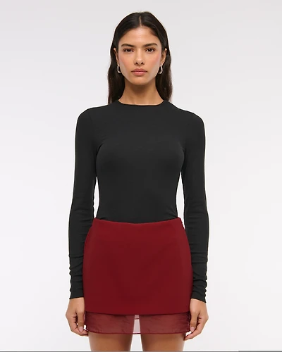 Mid Rise Sheer Hem Mini Skort