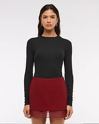 Mid Rise Sheer Hem Mini Skort