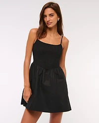 Dipped-Waist Smocked Mini Dress