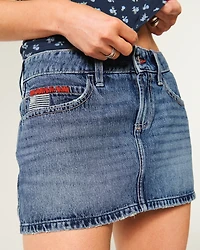 Low-Rise Medium Wash Flag Embroidered Denim Mini Skort